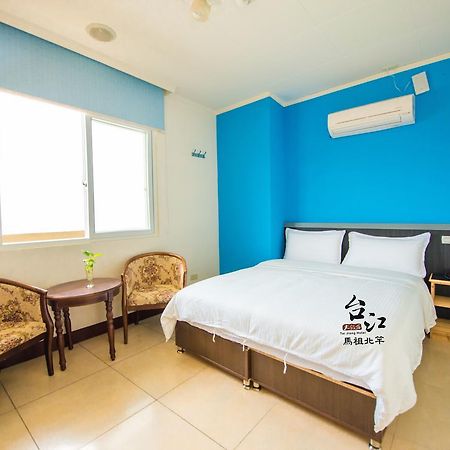 Taijing Hotel Бейган Екстериор снимка