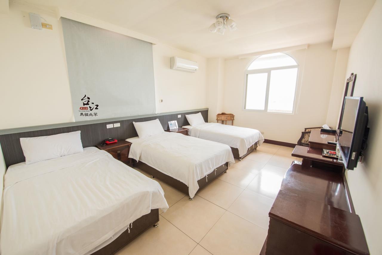 Taijing Hotel Бейган Екстериор снимка